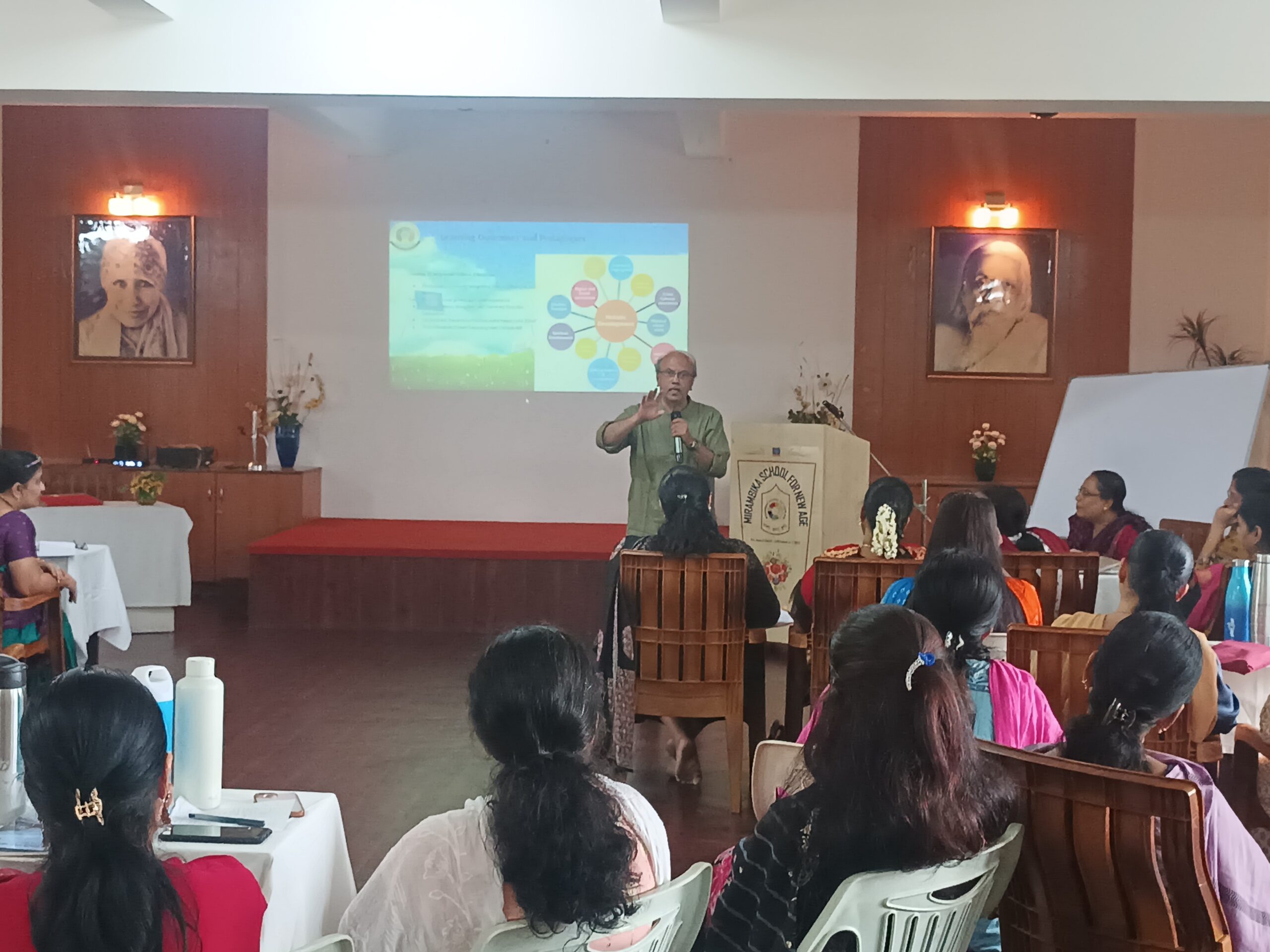 Dr. Ajit Sabnis conducting a teacher training session